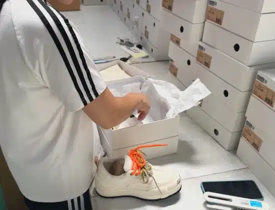China fulfillment warehouse performing product quality inspection and packaging checks for dropshipping orders